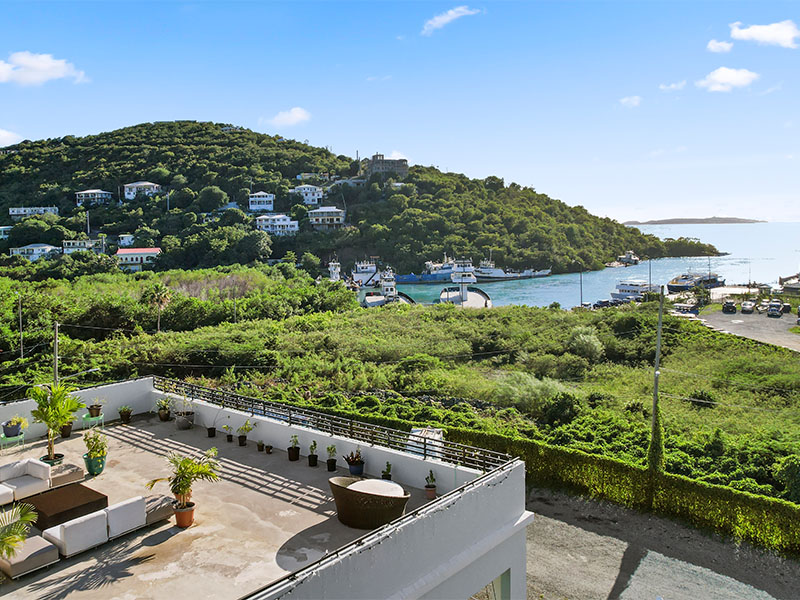 Rooftop terrace with stunning harbor and hillside views