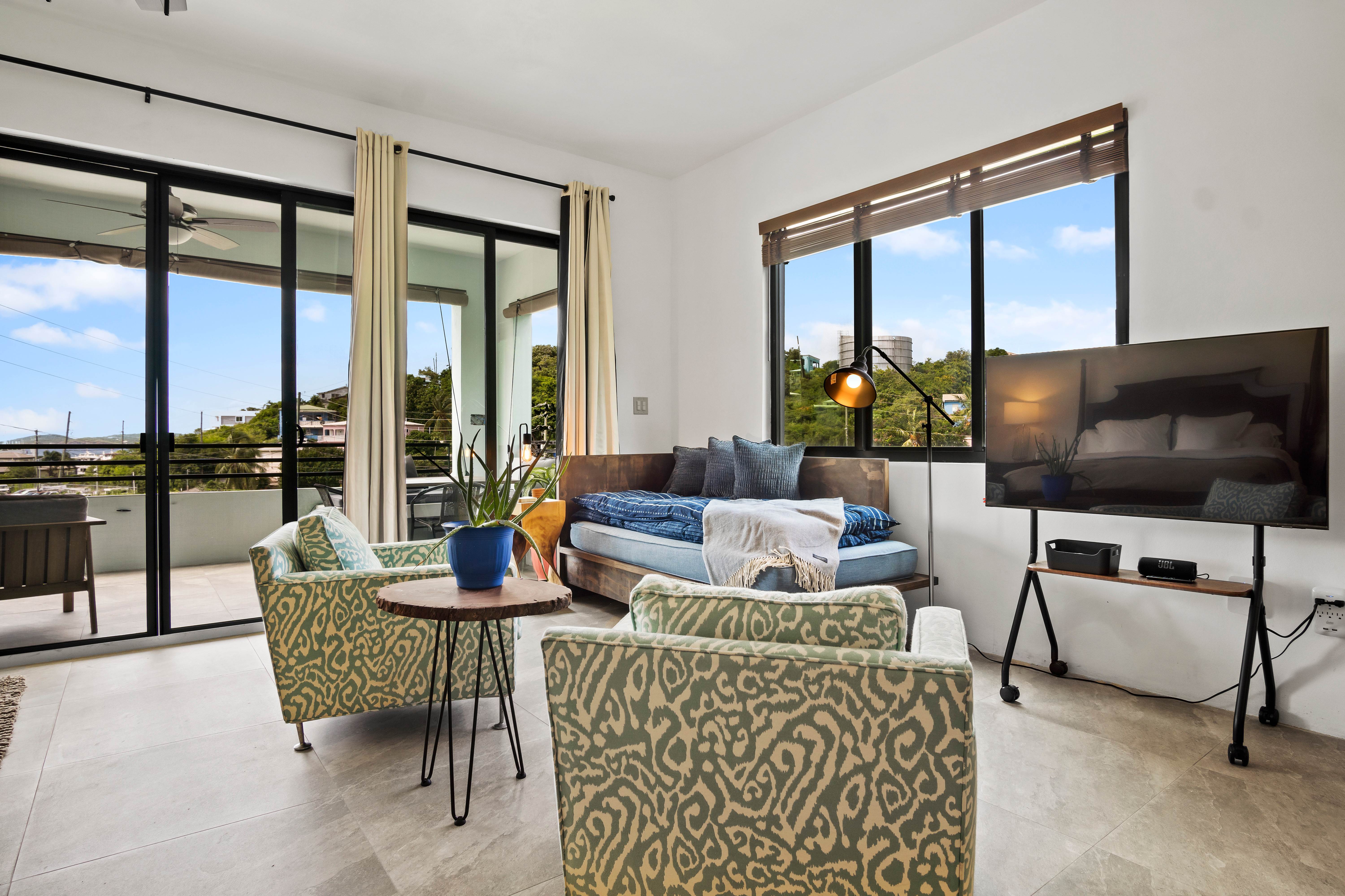 Living room with modern furnishings and panoramic windows